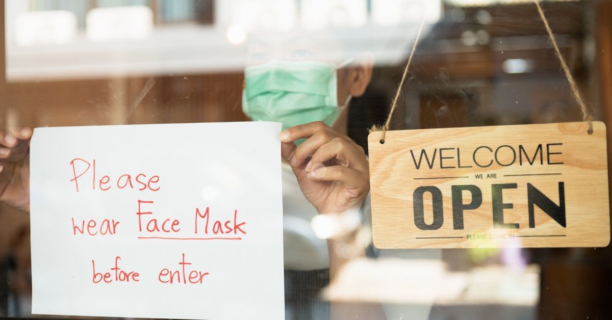 Small business reopens their doors with social distancing and CDC rules in place. 